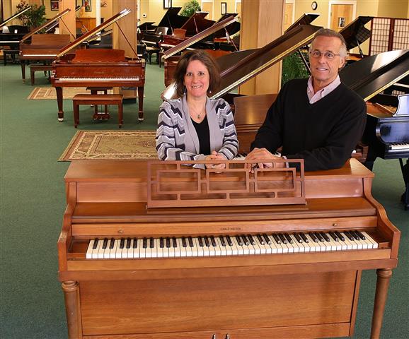 Larry Caruso with Emily Werner from the Regional Multicultural Magnet School Foundation